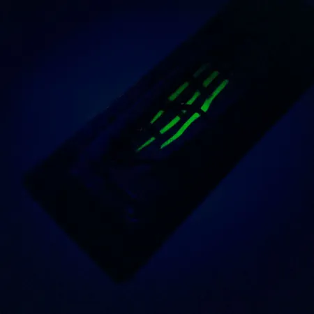 Luhr Jensen Crippled Herring Pilkki, Kelta-musta, 42g, Smash Flash, #10788