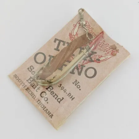 South Bend Trix-Oreno 594 Perhovapaviehe, Hopea/Punainen, 2 g, #24506