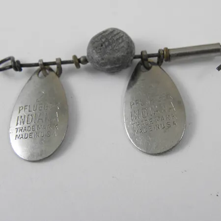 Pflueger Indiana -lippa, Nikkeli, 6g, Curly Tail, #1276