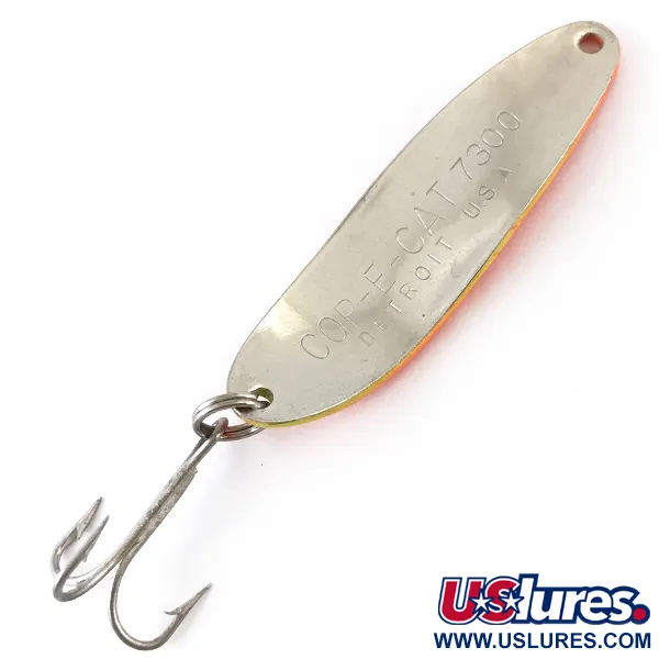 Dardevle Cop-E-Cat 7300 UV Lusikka, Keltainen/Oranssi/Nikkeli, 10g, #4887