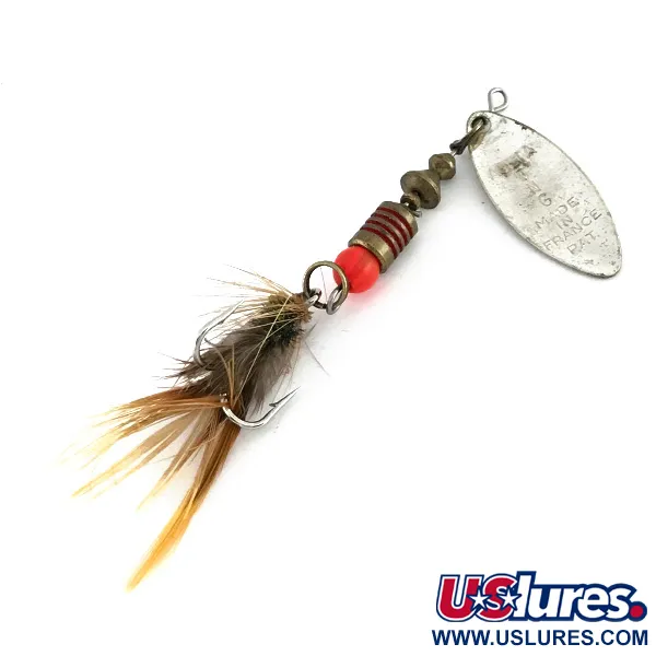 Mepps Aglia Long 1 Lippa, Hopea/Oranssi, 4.5g, UV-väri, #8257