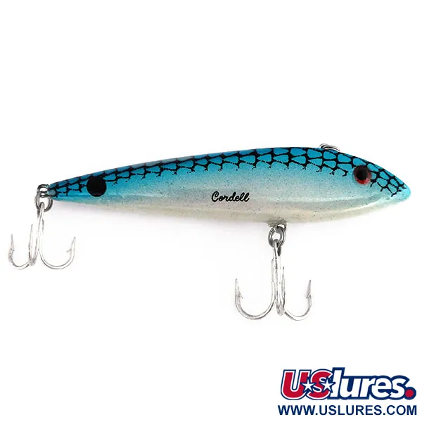 Cotton Cordell Ratt'l Spot G-finish Lipless, Sini-hopea, 21g, #9867